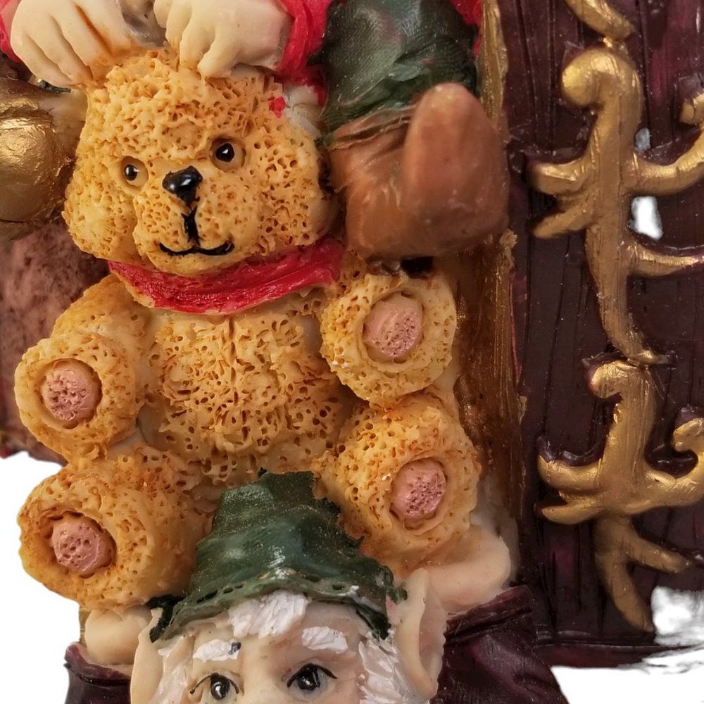 Santa in a Red Sleight Bed Resin Holiday Décor with Elves, Presents, And Toys - Picture 6 of 15
